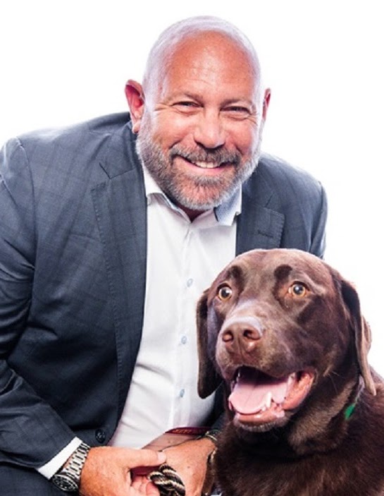 Seasons CEO Mike Lavelle and dog Fin