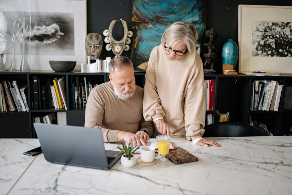 Senior Couple looking at computer