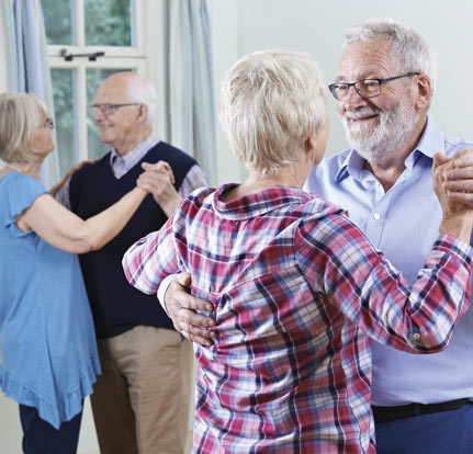 Two couples dancing