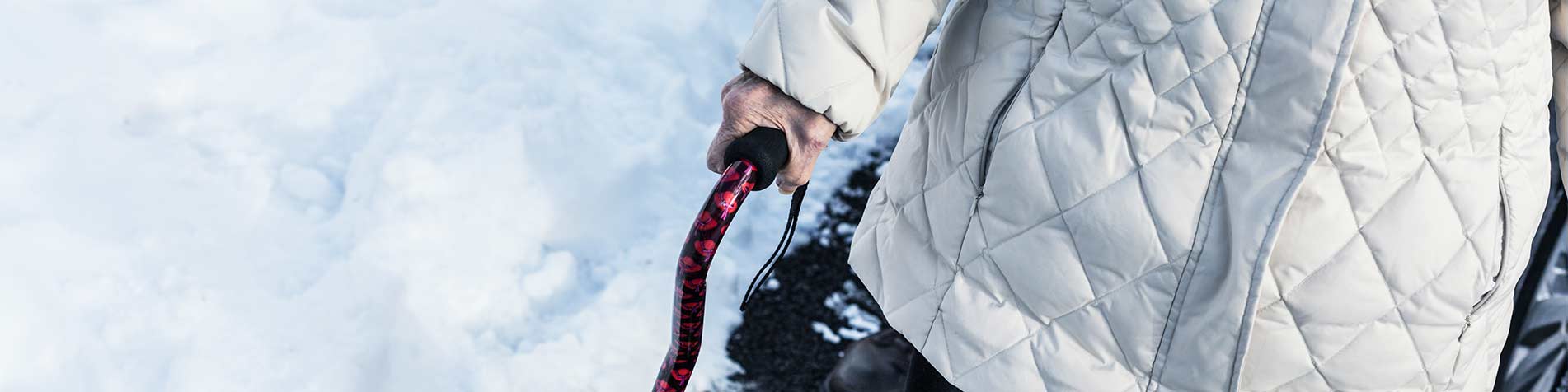 senior-walking-snow-winter-blog