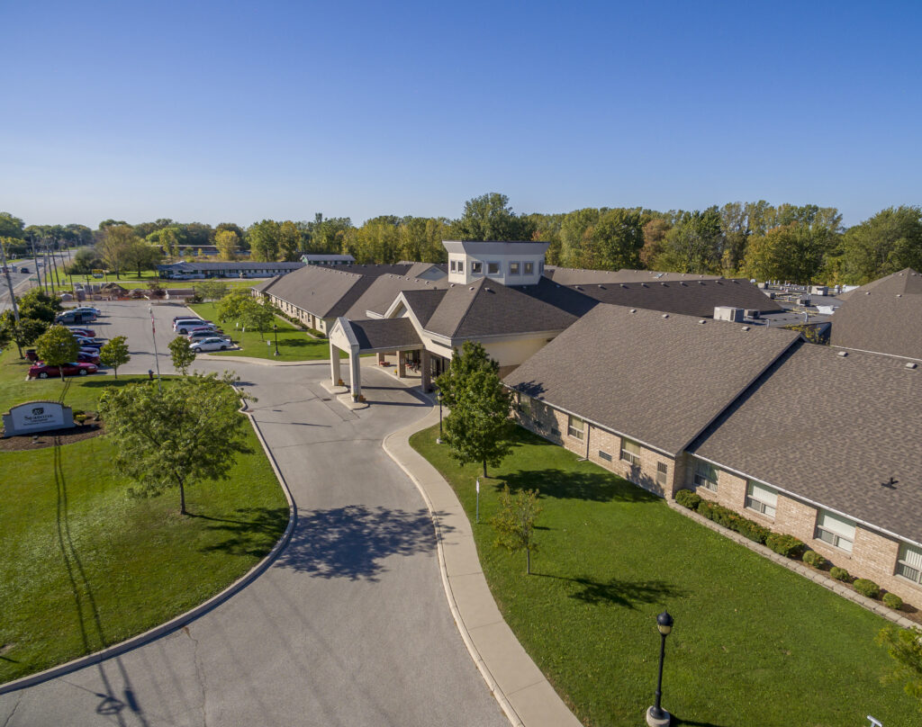 Seasons Belle River View of the Front Entrance and Surrounding Parking