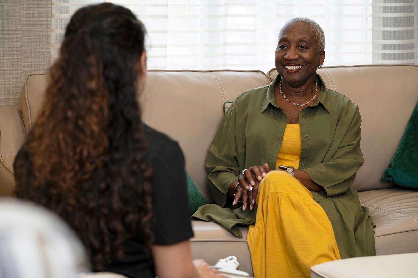 Seasons team member speaking with resident