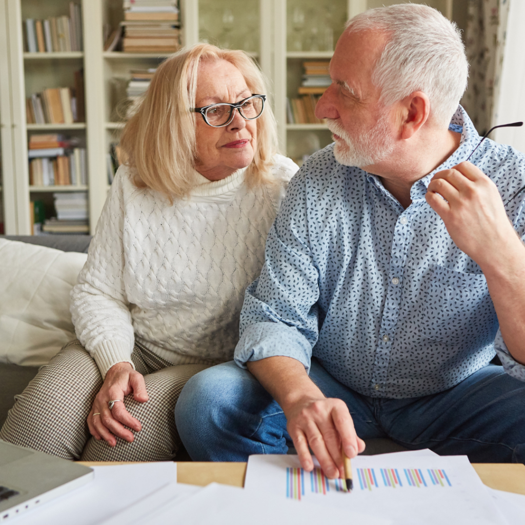 Elderly Couple Calculating Costs
