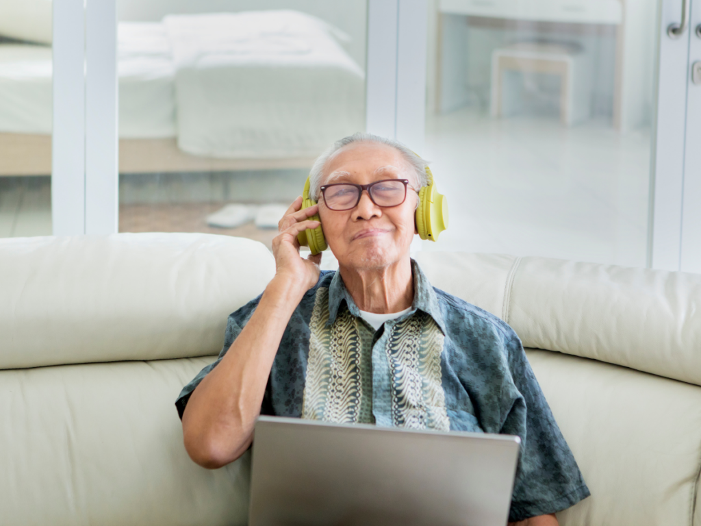 senior man listening to music