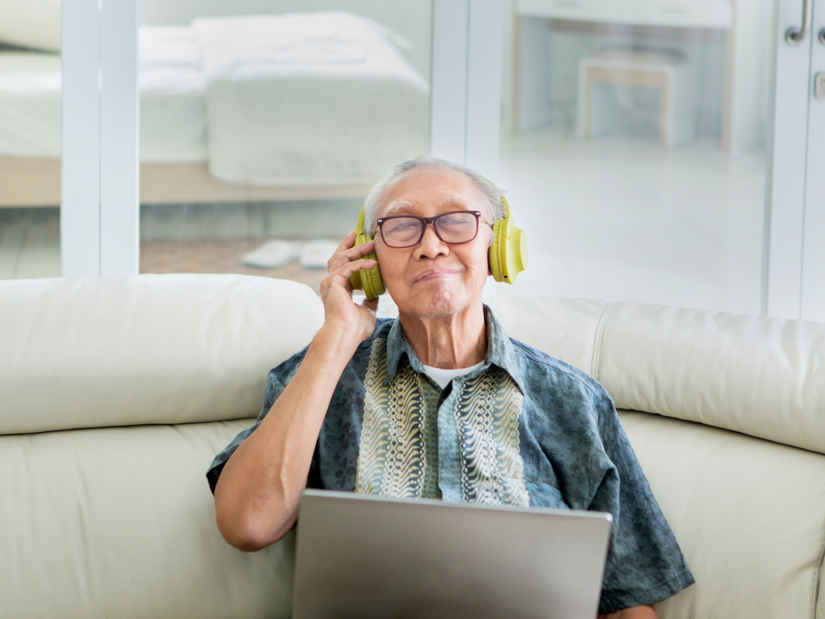 senior man listening to music