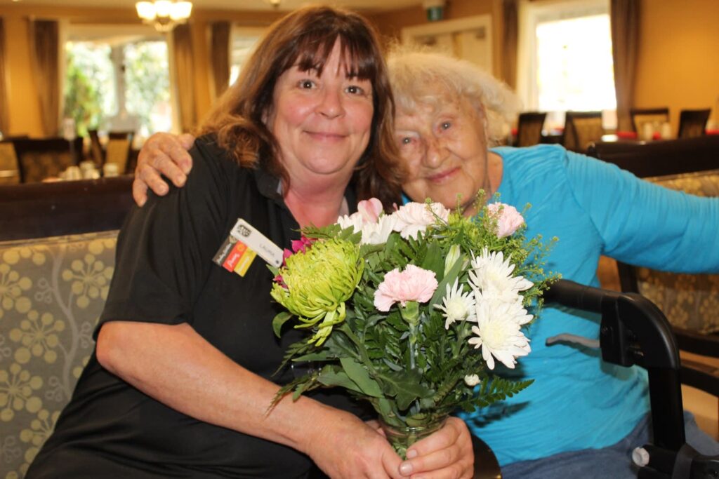 Seasons retirement team member and resident